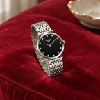 Montre Femme Extra-Plate Acier Bicolore – argent, cadran noir, index strass