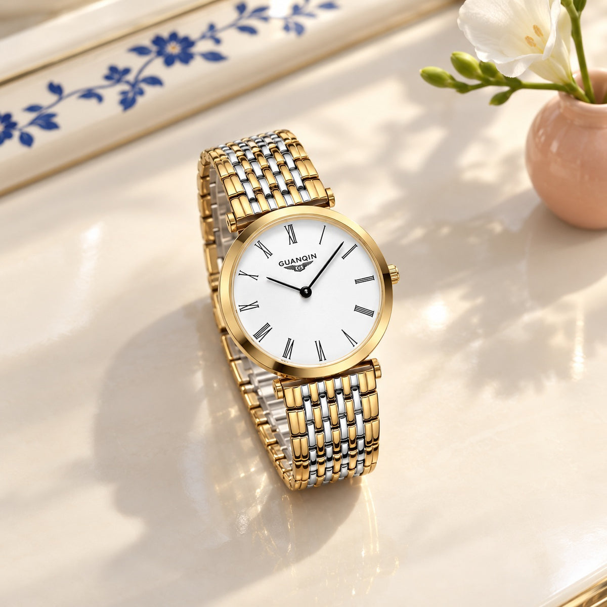 Montre Femme Extra-Plate Acier Bicolore – or bicolore, cadran blanc, chiffres romains