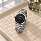 Montre Femme Extra-Plate Acier Bicolore – argent, cadran noir, index bâtons