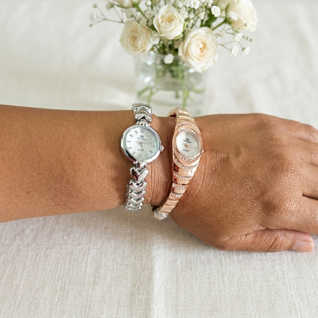 Montre Bijou Femme Ovale Sertie de Strass – argent et or rose, cadran nacré, portée au poignet