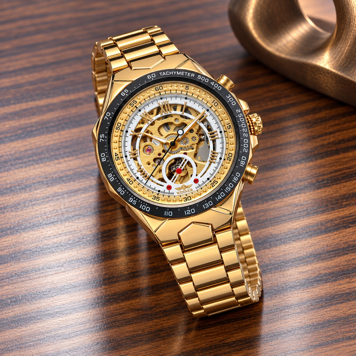 Montre Homme Squelette Sport Acier – boîtier et bracelet or, cadran squelette blanc/argent
