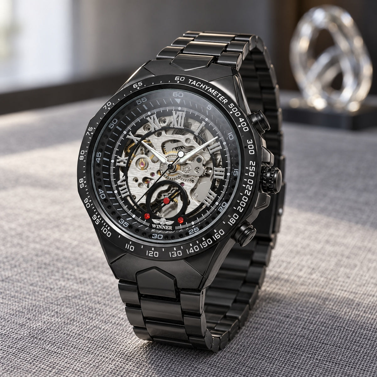 Montre Homme Squelette Sport Acier – boîtier et bracelet noirs, cadran squelette noir et argent