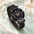 Montre Ciel Étoilé Bracelet Aimanté – boîtier et maille noirs, cadran noir étoilé, chiffres or rose