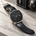 Montre Homme Extra-Plate Minimaliste – boîtier argent, cadran noir, cuir noir
