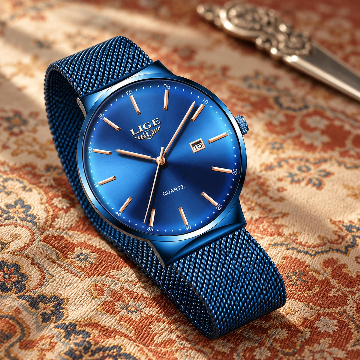 Montre Homme Extra-Plate Maille Milanaise – boîtier, cadran et maille bleus, index or rose